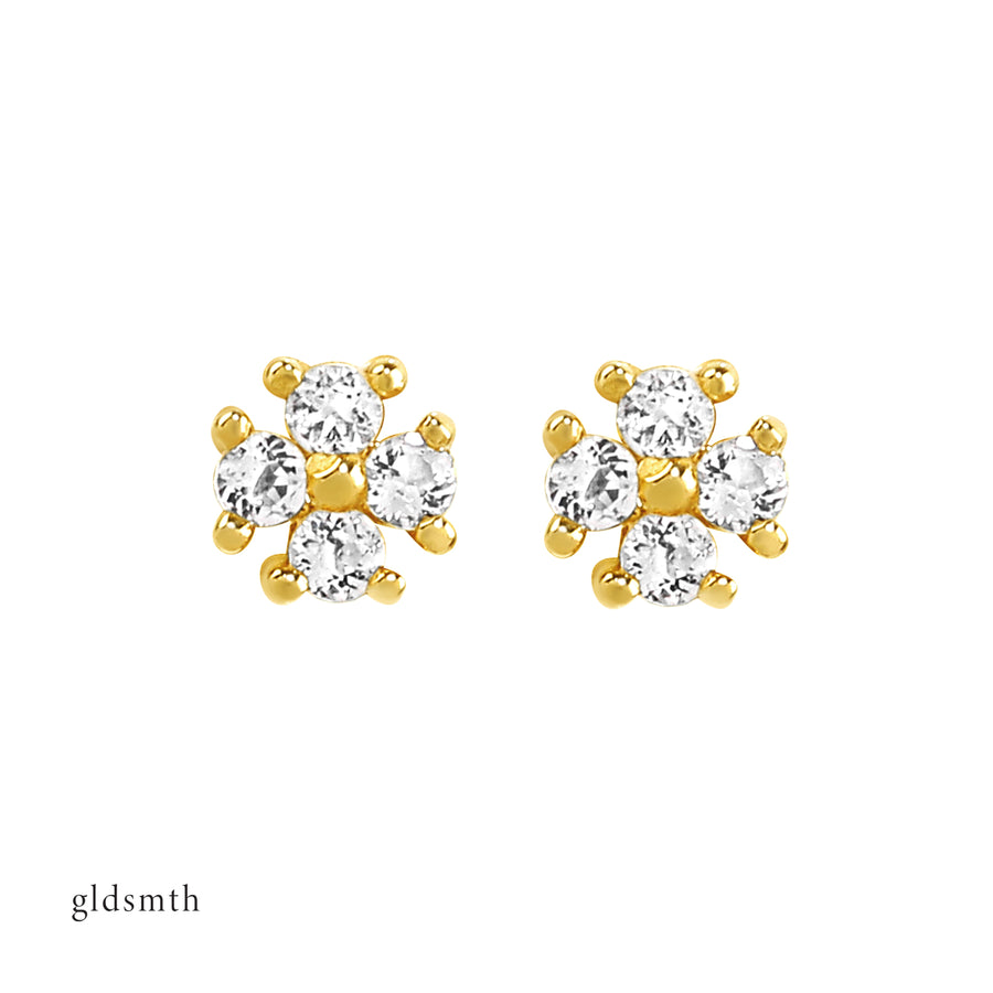 Handcrafted 14K solid yellow gold, set with white topazes.