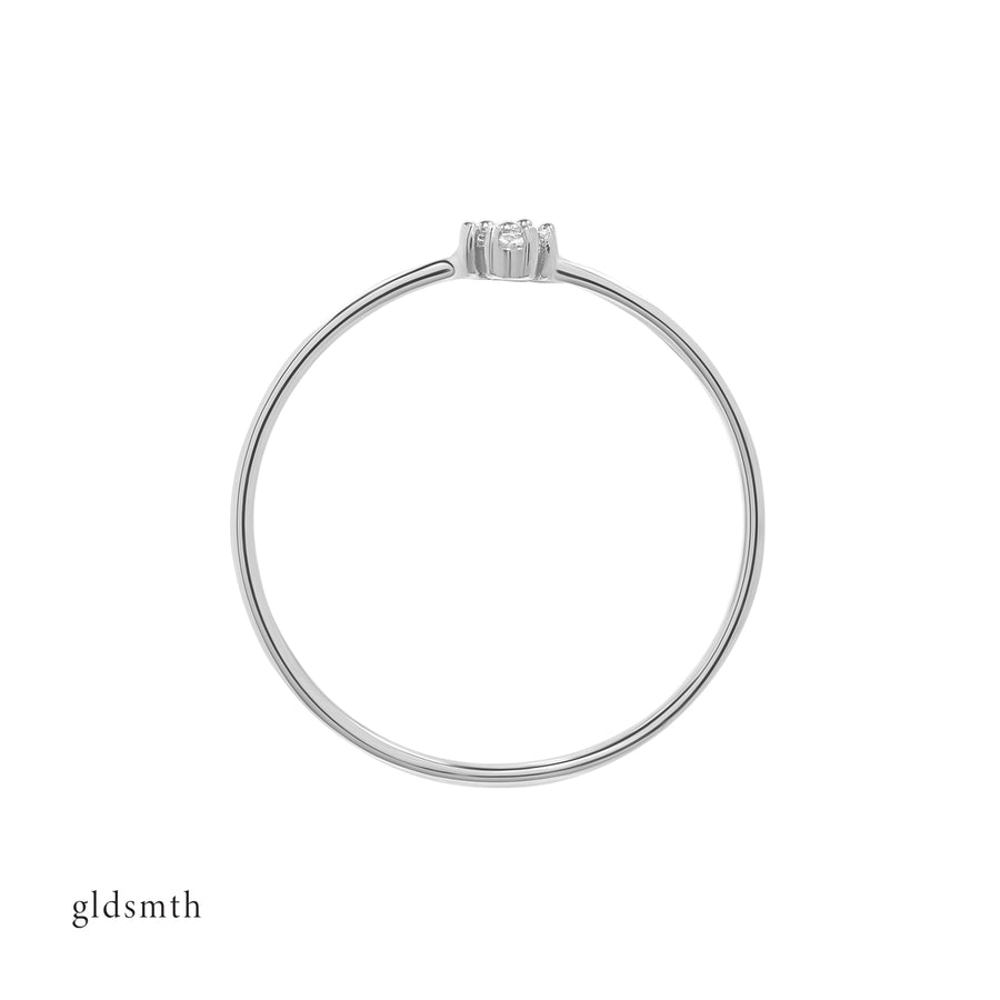 Elegant and fine ring. Handcrafted 14k solid white gold ring with white topazes.