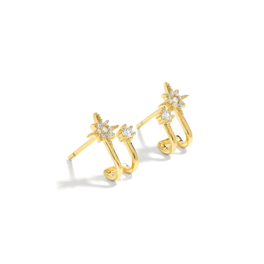 Elegant and statement studs. Gold hoop earrings set with cubic zirconia stones.