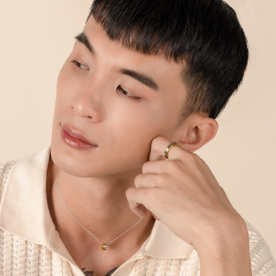 Model is wearing minimalist and sleek ring in 925 silver.