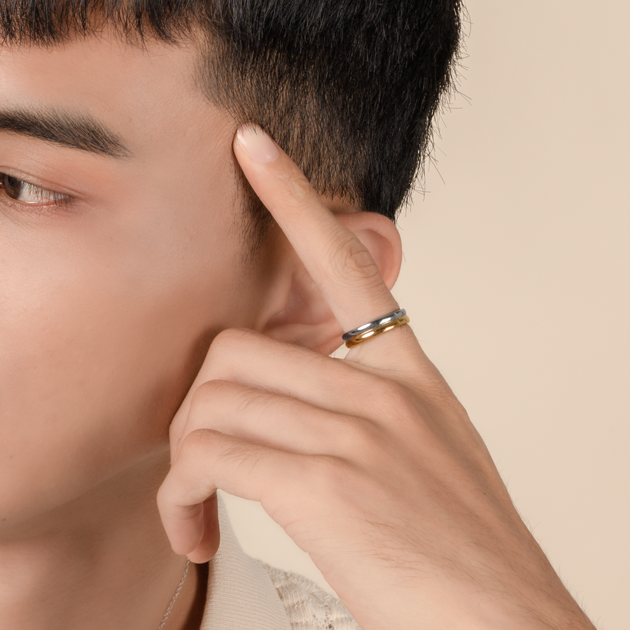 Model is wearing minimalist and sleek ring in 925 silver.