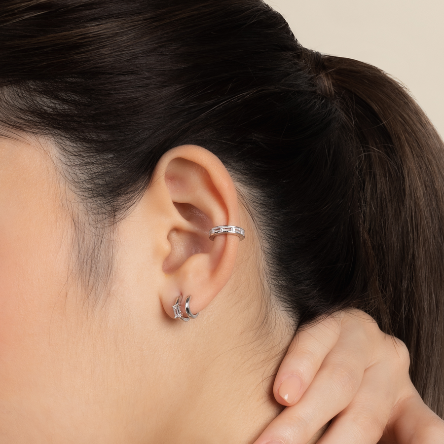 Model wears minimalist and classic ear cuff in 925 silver with cubic zirconia