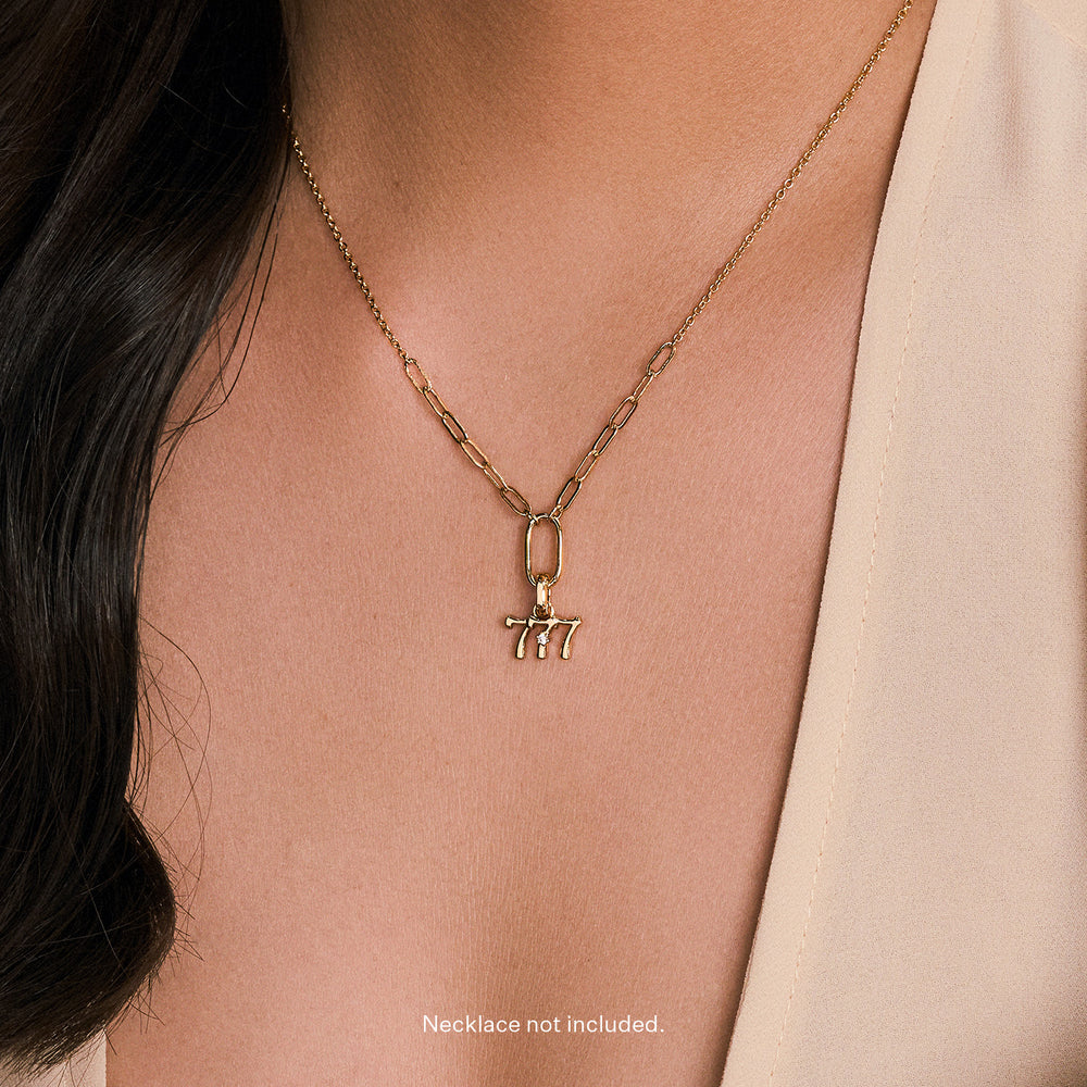 Gold 777 Charm