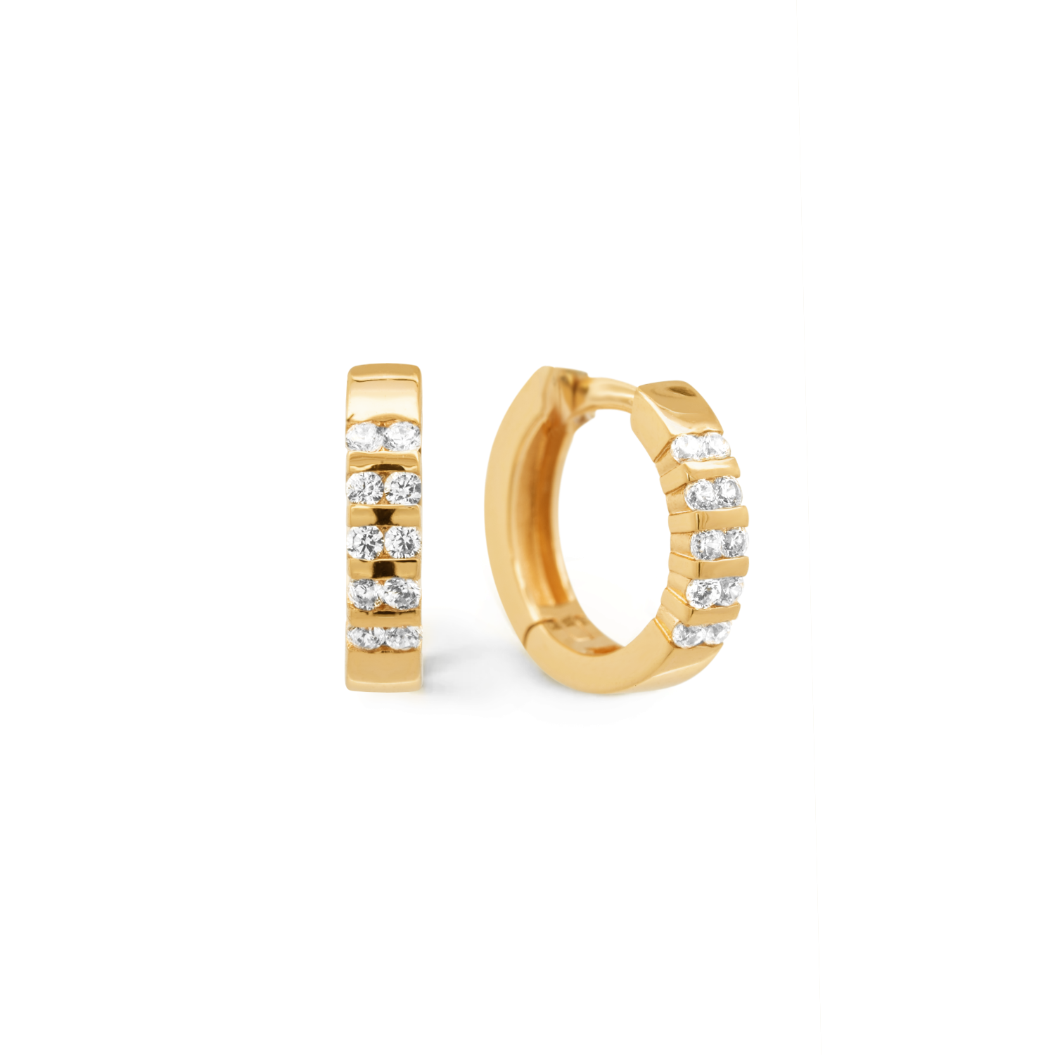 Timeless and elegant earrings. Gold huggies set with cubic zirconia stones. 