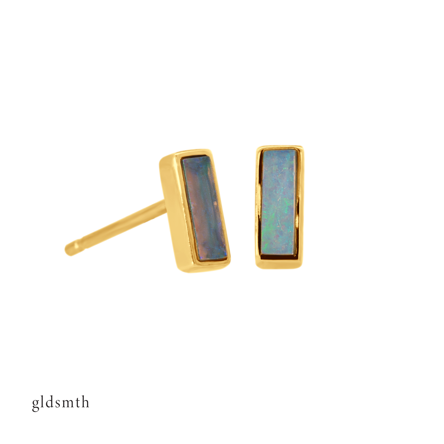Fine and dainty studs. Solid yellow gold earrings set with opals