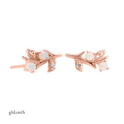 Fine and dainty studs. Solid rose gold earrings set with opals and conflict free diamonds