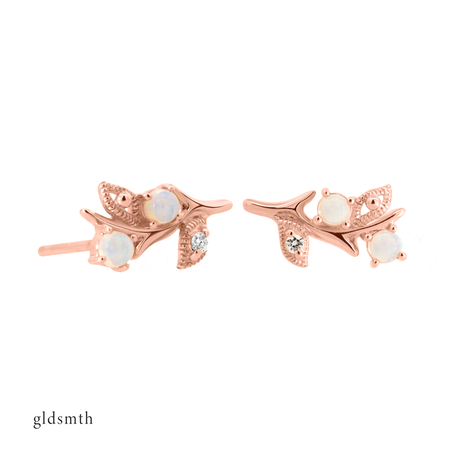 Fine and dainty studs. Solid rose gold earrings set with opals and conflict free diamonds