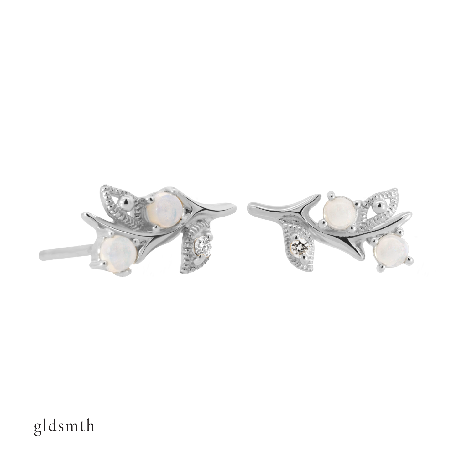 Fine and dainty studs. Solid white gold earrings set with opals and conflict free diamonds