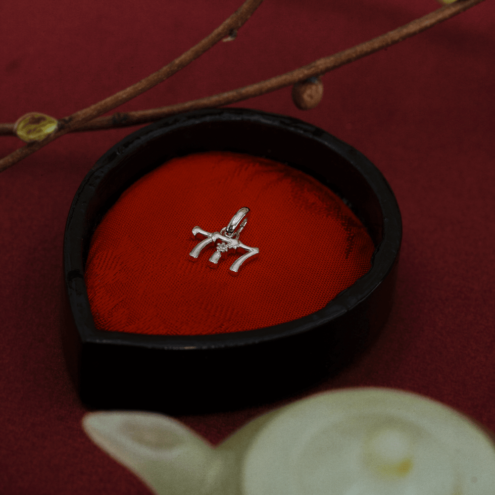 Silver 777 Charm