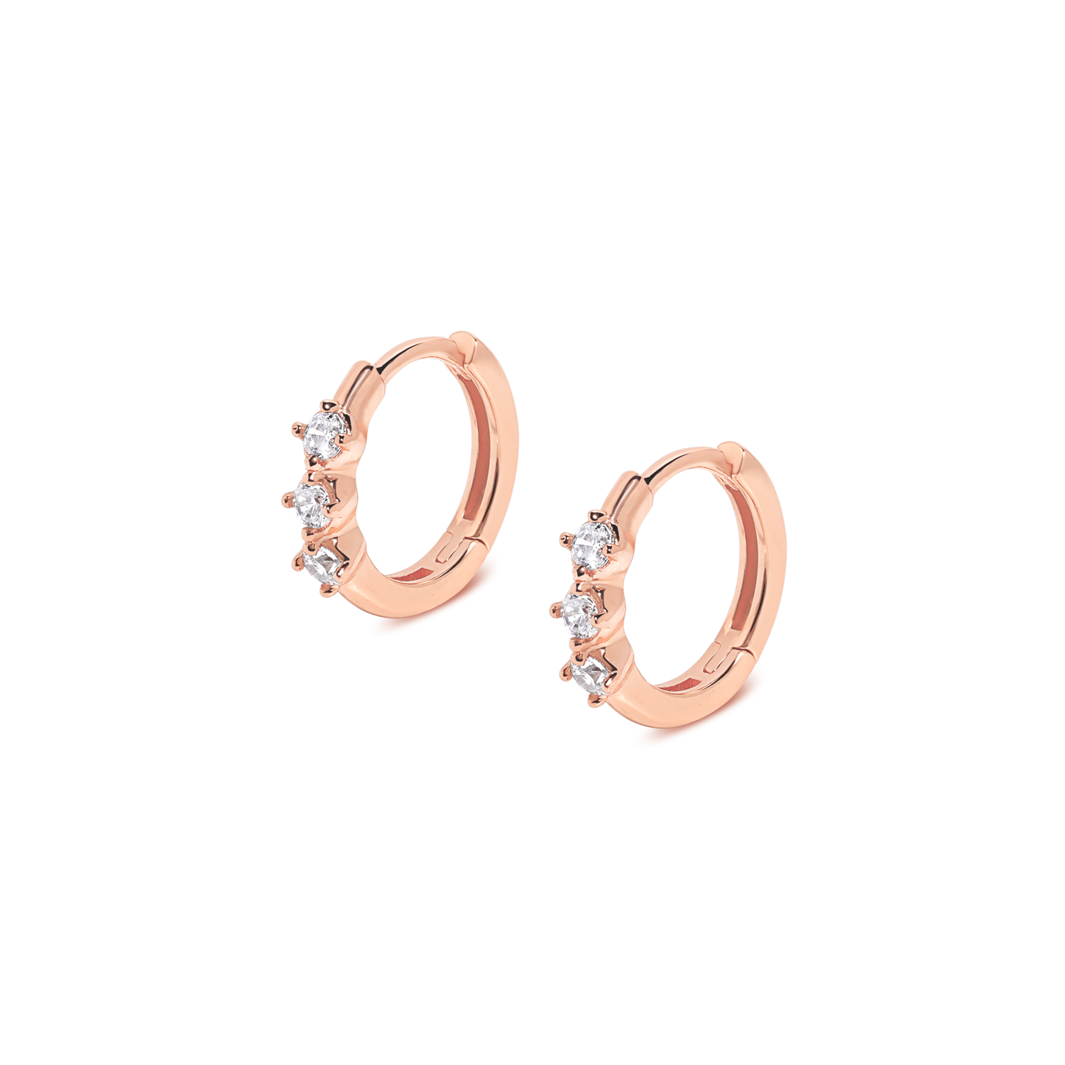 Luxurious and elegant earrings. rose gold huggies with cubic zirconia
