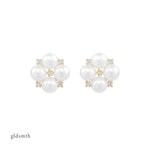Stunning and luxurious studs. Handcrafted 18k solid gold studs with conflict-free diamonds and akoya pearls