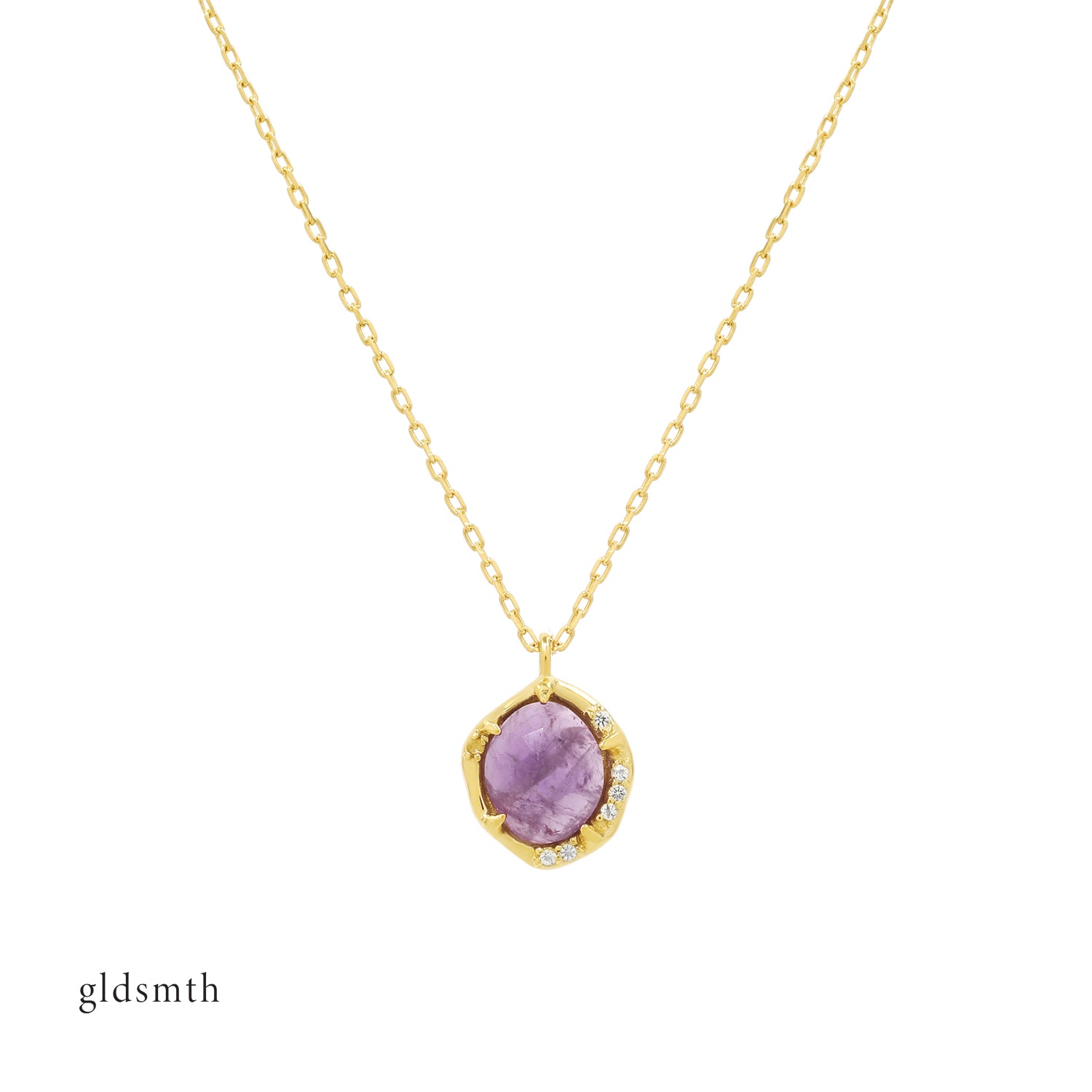 Handcrafted 14K solid yellow gold, set with an Amethyst and white topazes.
