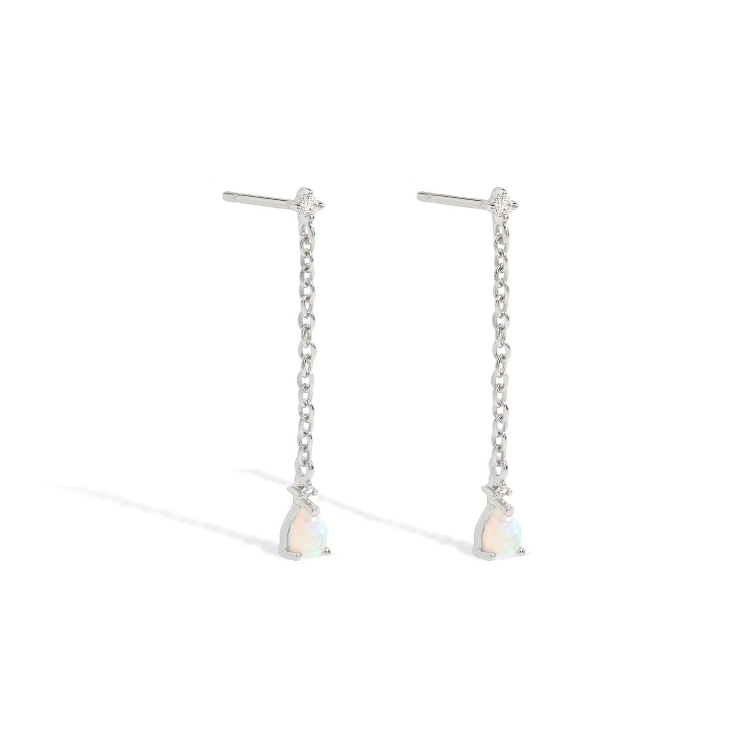 Elegant and statement drop earrings. 925 silver studs set with opals and cubic zirconia stones.