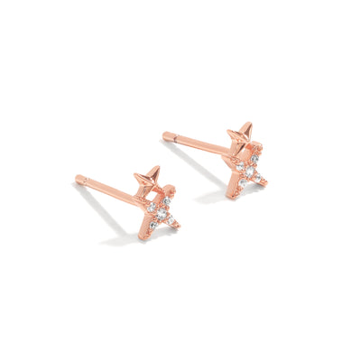 Simple and dainty studs. Rose gold earrings set with cubic zirconia stones.