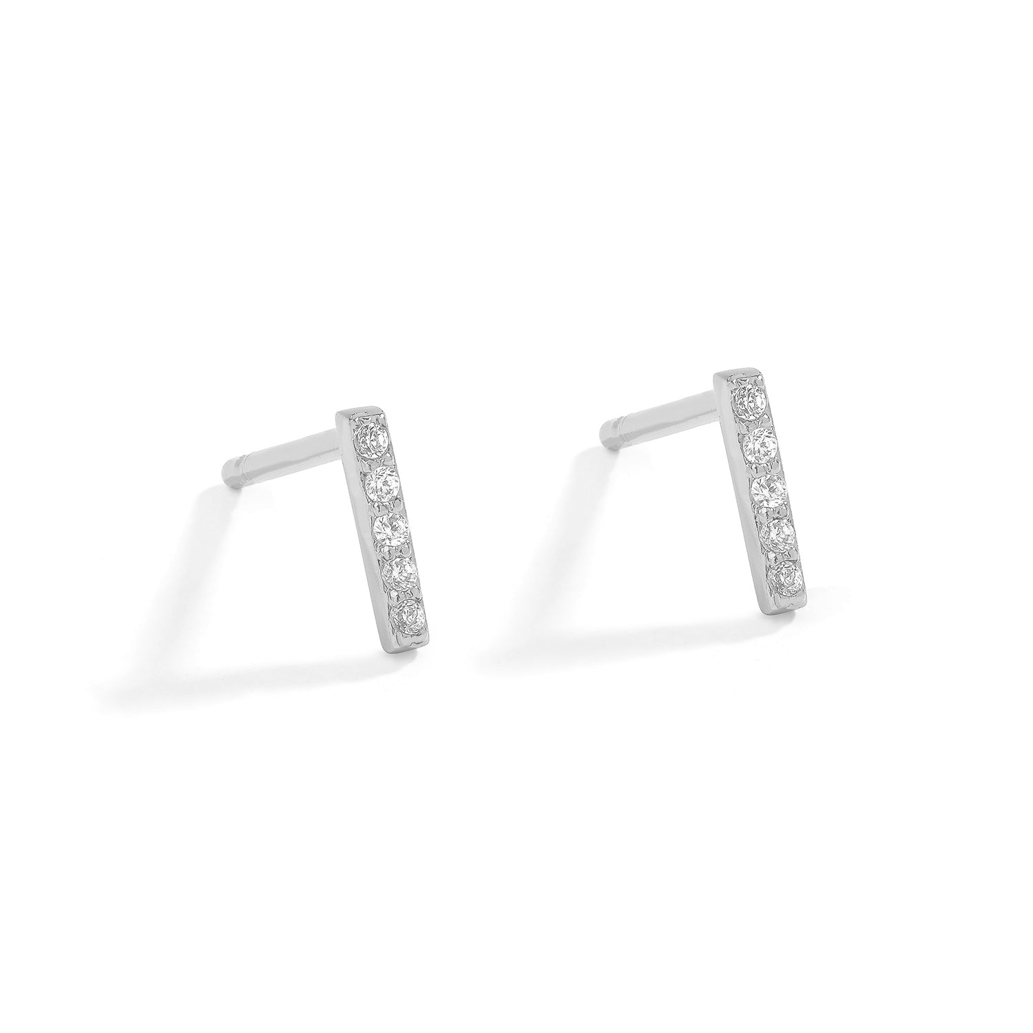 Dainty and minimalist initial studs. 925 silver earrings.