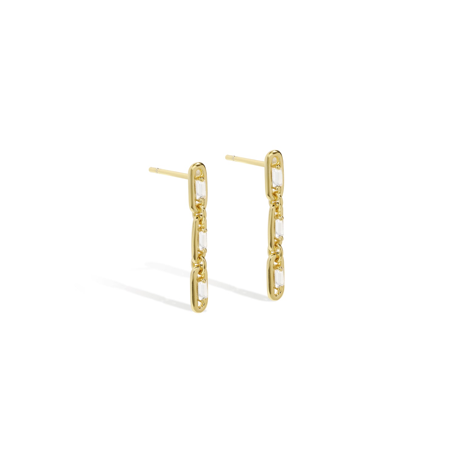 Elegant and bold earrings. Gold drop earrings with cubic zircona stones