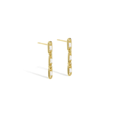 Elegant and bold earrings. Gold drop earrings with cubic zircona stones
