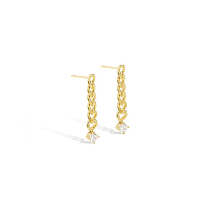 Elegant and bold earrings. Gold drop earrings with cubic zircona stones