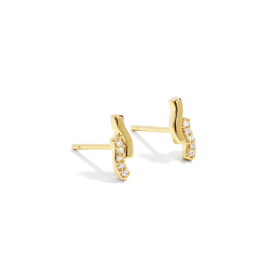 Dainty and elegant earrings. Gold studs with cubic zircona stones