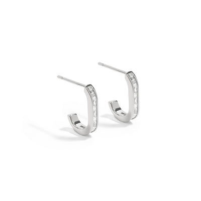 Minimalistic yet bold earrings. 925 silver stud hoops with cubic zircona stones