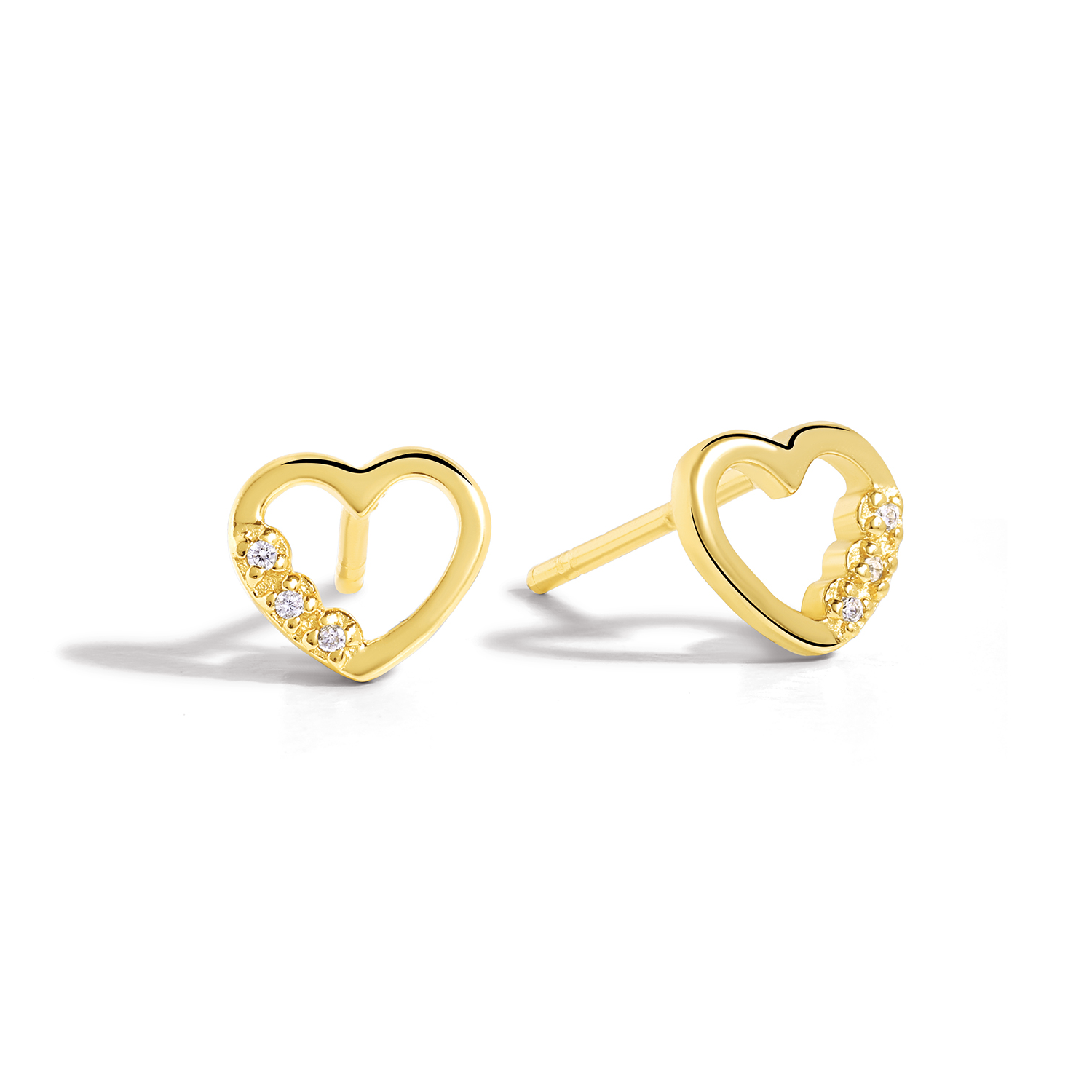 Dainty and minimalist studs in gold with cubic zirconia.