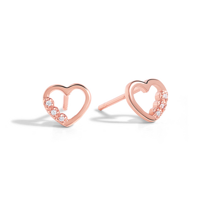 Dainty and minimalist studs in rose gold with cubic zirconia.