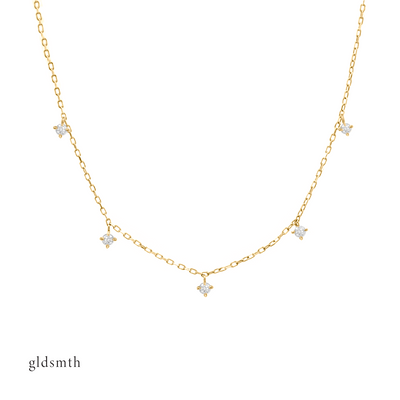 Graceful and delicate hand crafted 10k solid gold necklace with conflict-free diamonds.