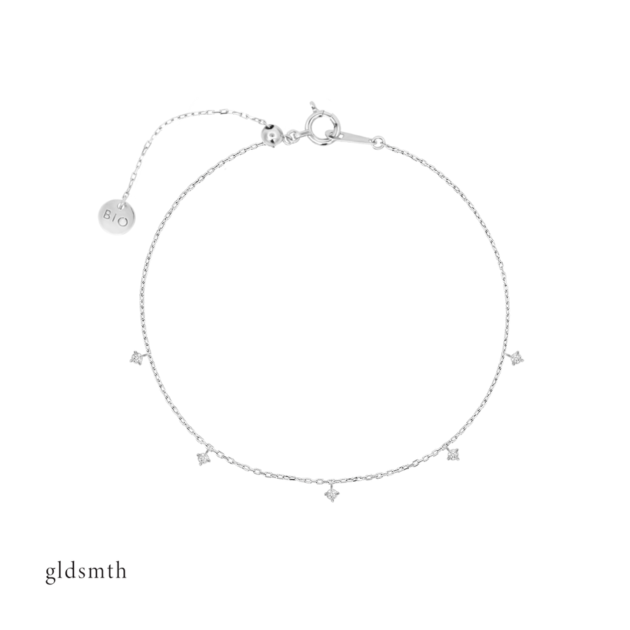 Graceful and delicate hand crafted 10k solid white gold bracelet with conflict-free diamonds.