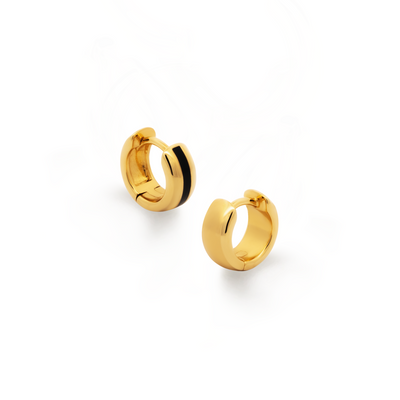 Edgy and bold earrings. Gold huggies with black enamel.