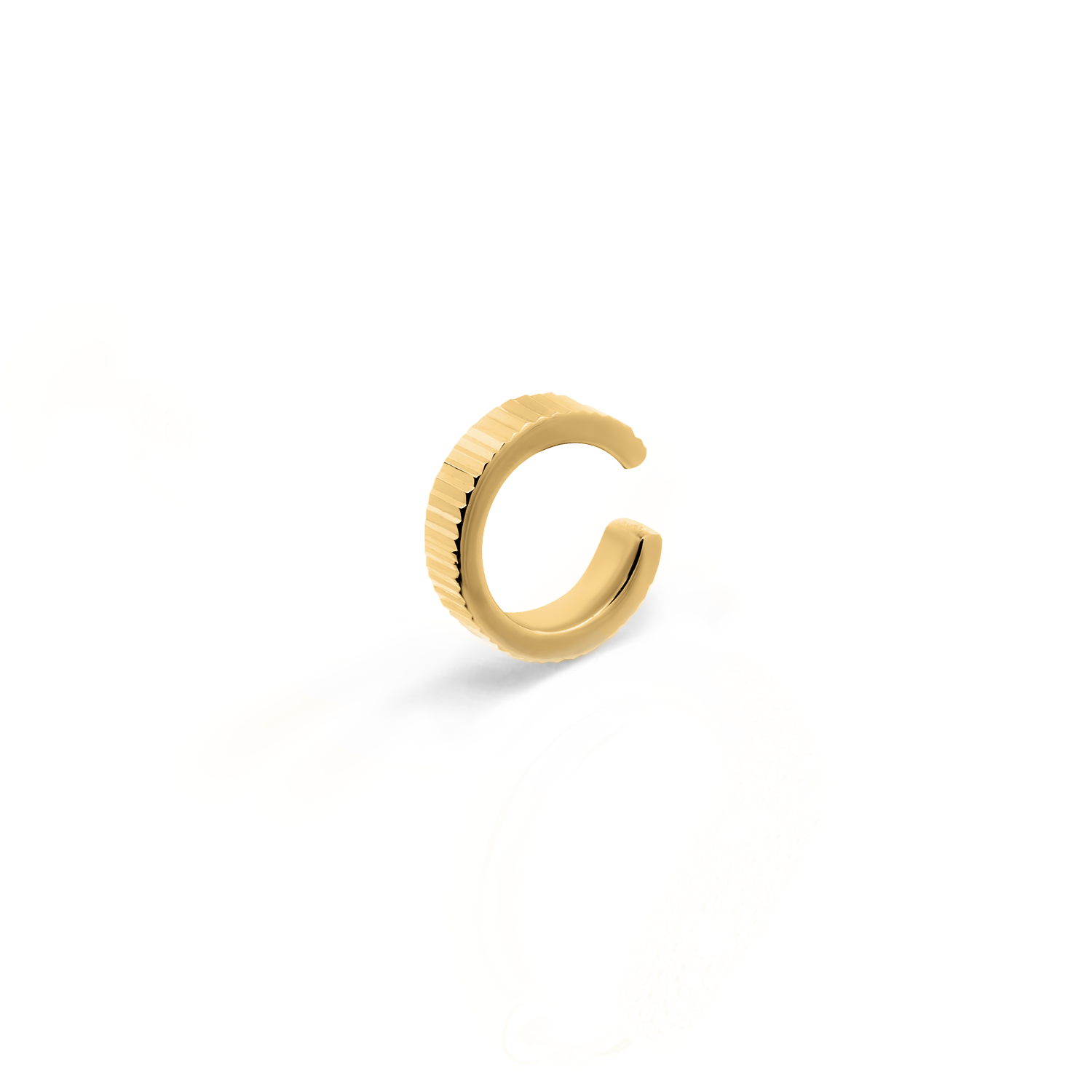 Elegant and statement textured ear cuff in gold.