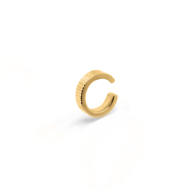 Elegant and statement textured ear cuff in gold.