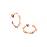 Minimalist and sleek earrings. Rose gold hoops.