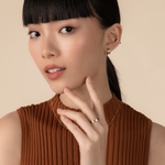 Model is wearing elegant and statement textured ring in gold.