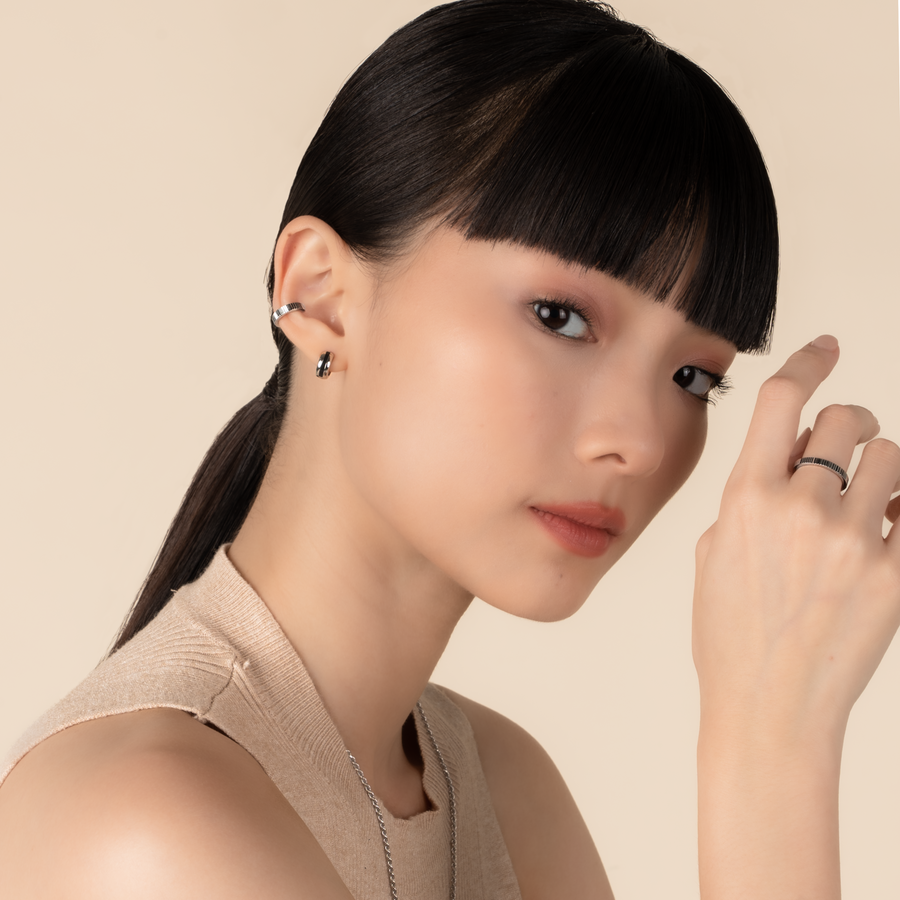 Model is wearing elegant and statement textured ear cuff in 925 silver.
