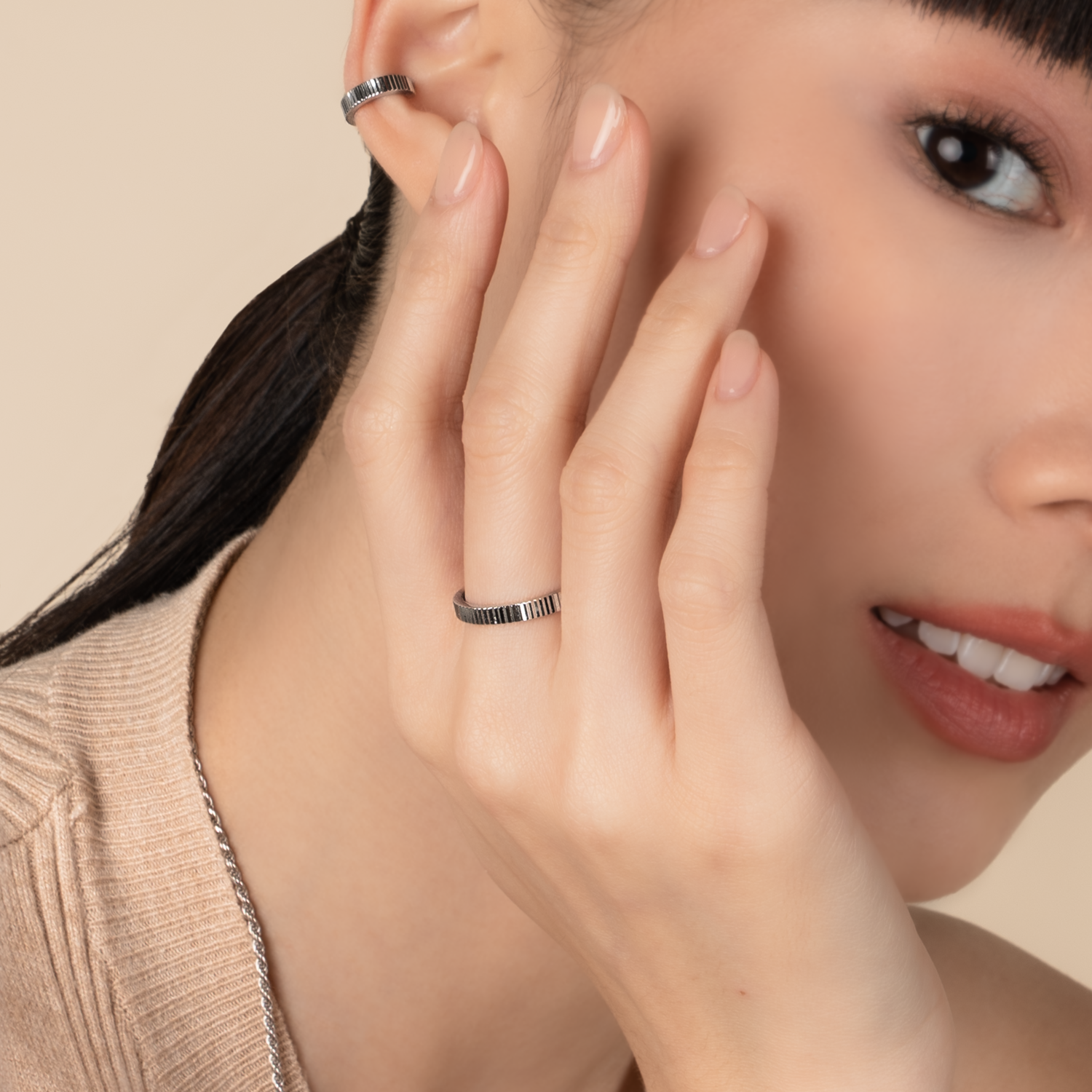 Model is wearing elegant and statement textured ring in 925 silver.