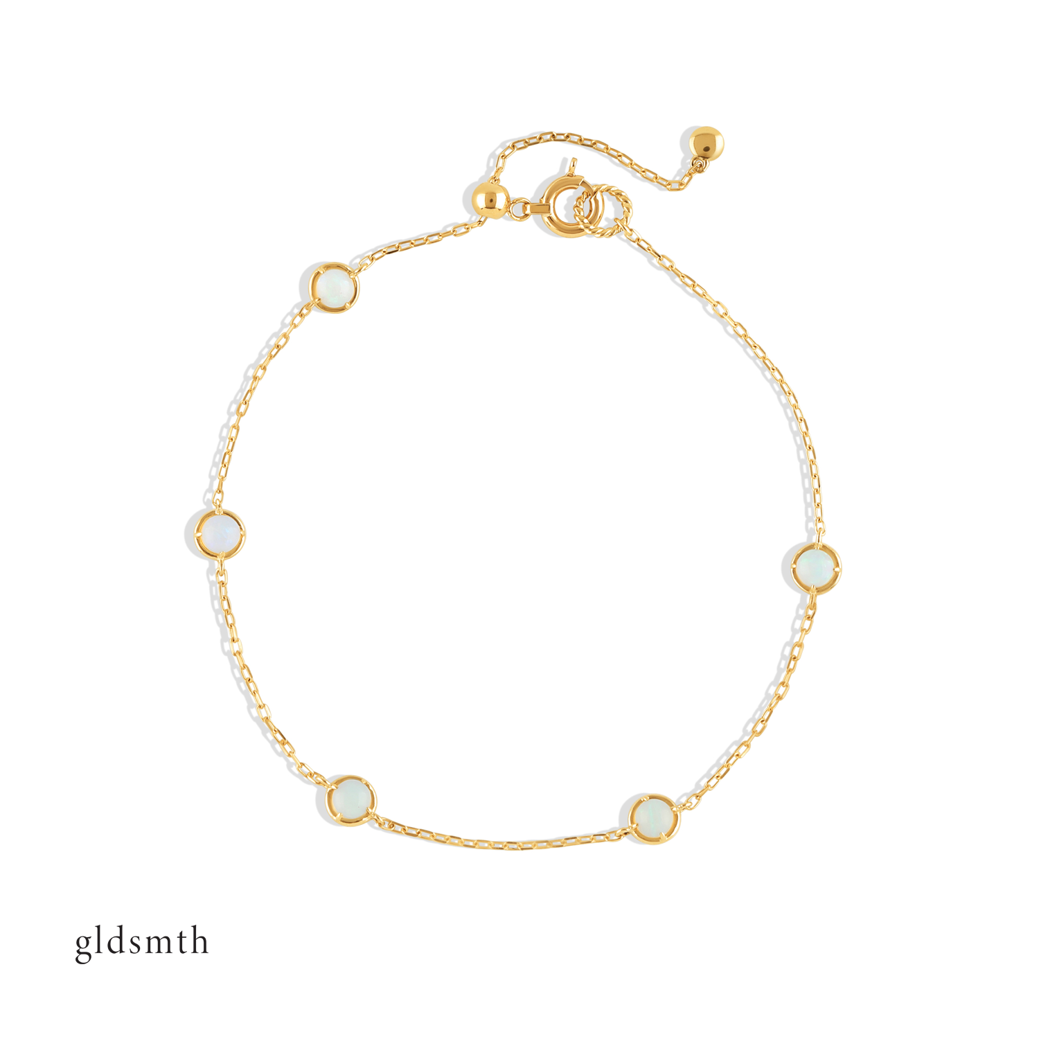 Elegant and fine handcrafted 10k solid gold bracelet with opals.