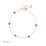 Elegant and fine handcrafted 10k solid rose gold bracelet with tanzanite.