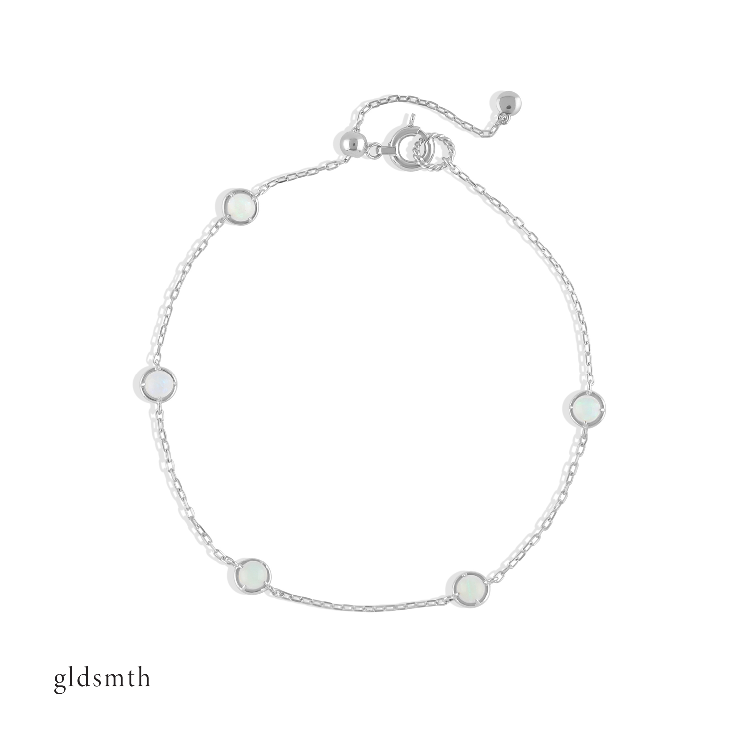 Elegant and fine handcrafted 10k solid white gold bracelet with opals.