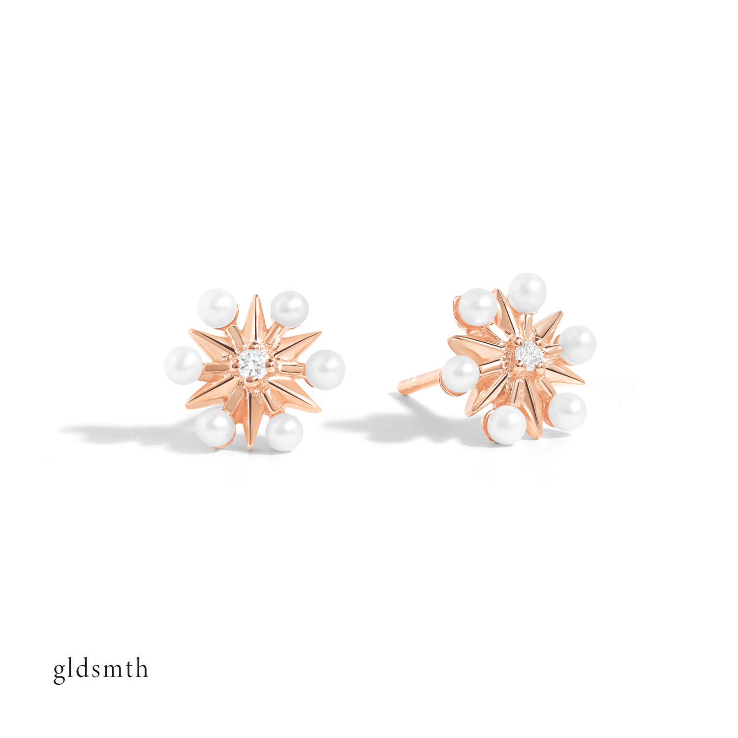 Dainty and fine earrings. Handcrafted 10k solid rose gold studs with conflict-free diamonds and freshwater pearls.
