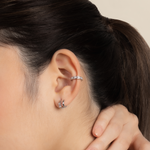 Model wears minimalist and classic ear cuff in 925 silver with cubic zirconia