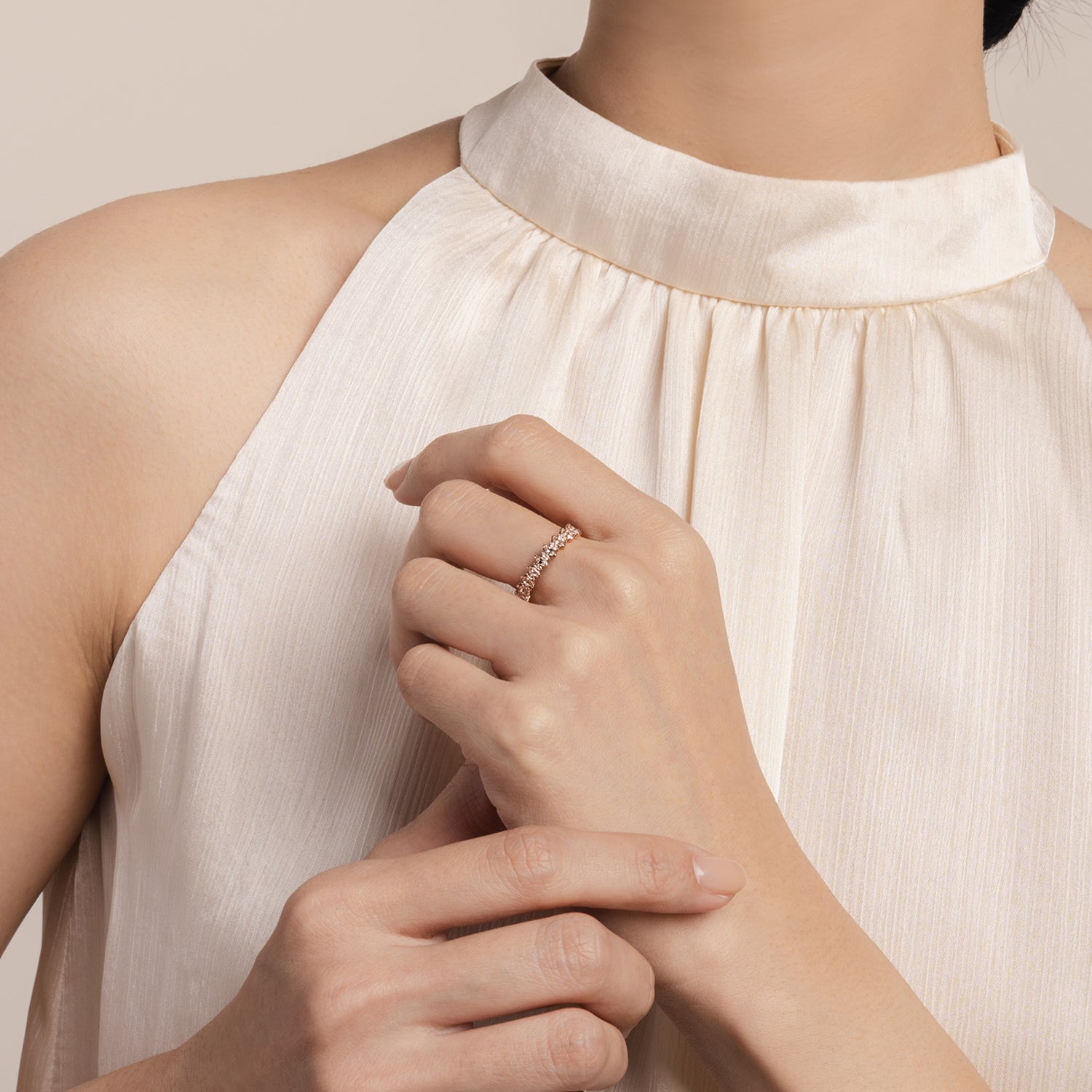 Elegant and statement ring. Model wears 14k solid rose gold ring with white topazes