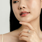 Elegant and statement earrings. Model wears 925 silver ring set with a freshwater pearl.