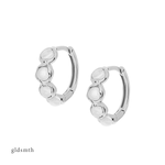 Elegant and fine earrings. Handcrafted solid white gold huggies set with moonstones.